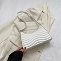 Modern white pleated shoulder bag with unique wave design and slender leather strap - White