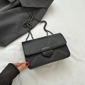 Black crossbody bag with silver stud triangles and metal chain strap in minimalist style - Black