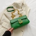 Fashionable emerald green crossbody bag with a large gold buckle and thick chain strap - Green