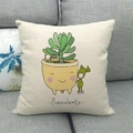 Close-up of linen cushion cover with cartoon succulent plant print on grey sofa - Yellow Smiling Pot Twin Succulents (5)