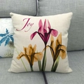 Linen cushion cover with transparent iris flowers and Joy text on a gray sofa - Transparent Iris Flower Joy (10) / 18x18 Inch