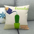 Close-up of linen cactus pillowcase with watering can print on a grey fabric sofa - Eriocactus Style A (11)