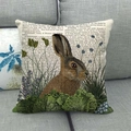 Detailed texture of rustic linen pillowcase featuring a vintage rabbit and botanical print - Dictionary Overlay Rabbit Style / 45x45cm