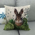 Detailed close-up of linen pillow cover featuring vintage rabbit and botanical leaf print - Ancient Document Typography Rabbit / 45x45cm