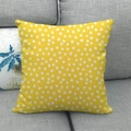 Macro detail of yellow cotton linen pillow cover with white dots and textured weaving - Yellow Polka Dot