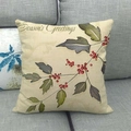 Detailed texture of linen pillowcase with Season's Greetings Christmas print - Red Berry Green Leaf Style