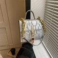 Silver square bag with textured leather, gold chain accent, and top handle for women - Silver