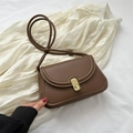 Minimalist dark brown leather shoulder bag with elegant golden twist lock and adjustable strap - Brown