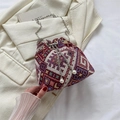 Vintage woven bucket bag with ethnic patterns, silver chain strap, and large pearl charms - Red