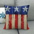 Rustic American flag star pillow cover on a grey sofa, featuring wooden texture design - 18x18 Inch / Vertical Wood Red White Stripes Style (6)