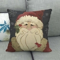 Linen Christmas pillow case with Santa Claus print on a grey sofa for holiday decor - Vintage Santa Claus (13)