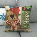 Linen Christmas pillowcase featuring a festive bear and tree pattern on a gray sofa - Wonderful Life Christmas Bear (7)