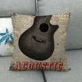 Detail view of vintage acoustic guitar cushion cover on a gray sofa with linen texture - Black Guitar Dictionary (11)
