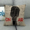 Macro shot of vintage microphone throw pillowcase with ON AIR text on sofa - Live Microphone (14)