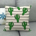 Linen cushion cover with green cactus print and gray white stripes on a gray sofa - Gray Striped Cactus Style (22)