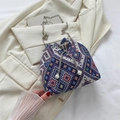 Ethnic woven bucket bag with geometric patterns and pearl drawstring detail - Blue