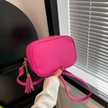 Magenta lychee pattern crossbody bag with golden zipper and stylish tassel detail - Rose Red