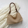 Handgewebte Hobo-Tasche aus Stroh in Beige mit dunkelbraunem Lederriemen und Knotendetail - Braun