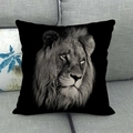Detail of lion head print on black linen throw pillow case on a grey sofa background - Lion Head Black Background (17)