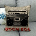 Vintage boombox print throw pillow case on grey sofa with retro newspaper background - Radio Boombox (13)