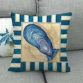 Detailed view of linen cushion cover featuring a blue shell print and striped borders - Blue Mussel Striped Style (2)