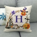 Fodera per cuscino Halloween con zucca acquerello e lettera H viola su divano beige - Lettera H Viola (8) / 45x45cm