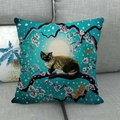 Close-up of linen pillowcase featuring a Siamese cat and cherry blossoms on a sofa - Lake Blue Tone Siamese Cat (15) / 18x18 Inch