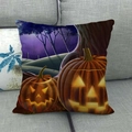 Linen Halloween pillow case with glowing pumpkins and spooky night scene on a sofa - Purple Night Sky Pumpkin