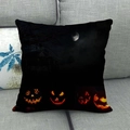 Macro detail of Halloween linen pillowcase featuring Jack-o-lanterns and moonlit castle - Quiet Moon Night Pumpkin