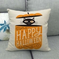 Halloween linen throw pillow with black cat and pumpkin print on a gray sofa - Happy Halloween Pumpkin Black Cat Pattern (Style 2)