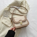 Retro cream and tan crossbody bag featuring a golden rabbit clasp and adjustable strap - Khaki