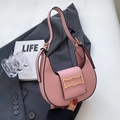 Chic pink crescent shoulder bag with golden geometric clasp and adjustable strap - Pink