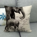 Black and white elephant print throw pillow cover on grey sofa home decor - Warm Elephant Family Art (14)
