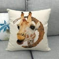 Detail of linen pillowcase with giraffe illustration on a grey fabric sofa - Giraffe Head with Brown Splash (3)