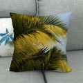 Close-up of tropical palm leaf print on durable linen cushion cover on a grey sofa - 18x18 Inch / Blue Sky Yellow Green Palm Leaf (15)