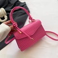 Pink minimalist crossbody bag with vertical pleated texture and knotted top handle - Pink