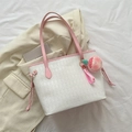 White quilted tote bag with pink trim, drawstring detail and a peach plush charm - With Pendant Style / Pink
