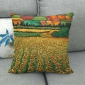 Linen pillowcase with vibrant sunflower oil painting on a gray fabric sofa background - 45x45cm / Vivid Sunflower Field Oil Painting Style (19)