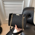 Chic black felt crossbody bag with diamond quilting and gold chain strap detail - Black