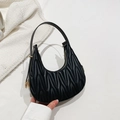 Chic black crescent hobo bag with pleated texture and golden metal hardware - Black