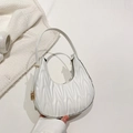 White matelassé crescent hobo bag in quilted faux leather with gold hardware - White