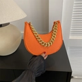 Orange felt bag with crocodile pattern and chunky gold chain handle for women - Orange