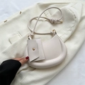 Minimalist crescent shoulder bag in creamy white faux leather with matching pouch - White