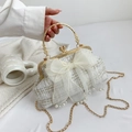 White tweed shell bag with organza bow, pearl tassels and gold handle crossbody - White