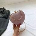 Pink glitter heart-shaped clutch bag with gold chain strap and jewel clasp closure - Pink