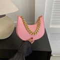 Pink snake-pattern crescent bag with chunky gold chain strap and animal texture - Pink