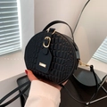 Chic black round crossbody bag with crocodile embossed pattern and gold hardware - Black