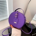 Chic purple crocodile embossed circular crossbody handbag with gold hardware details - Purple
