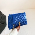 Quilted chain shoulder bag in bright metallic blue with a golden rectangular clasp - Blue