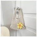 Detail of hand-woven hollow mesh cotton tote with a fabric daisy flower decoration - Off-white with Pendant